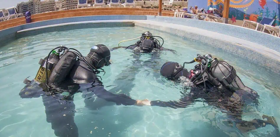 First time diving in Malta, divers learn to dive in Malta, Pool dive, confined waters